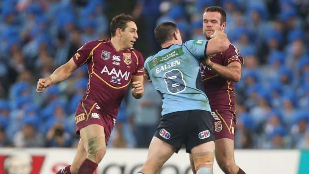 Changing landscape: Paul Gallen collects Nate Myles during the 2013 Origin series. Punching was banned after that incident.