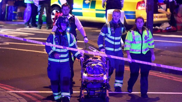 Police and ambulance crews on the scene at Finsbury Park.
