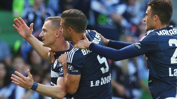 Strike force: Melbourne Victory's Besart Berisha celebrates after scoring a penalty against Perth Glory.