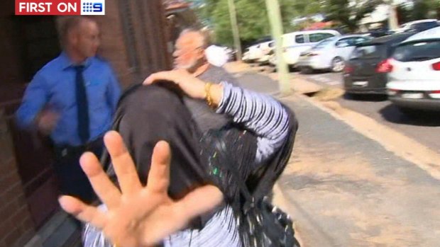 Haisem Zahab's wife lashed out at a television camera after his appearance in Young Local Court on Tuesday.
