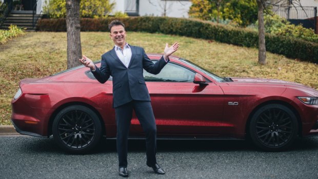 Steve Thomas after being reunited with his red mustang after having it hijacked in Yarralumla on Thursday morning.