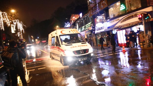 An ambulance rushes from the scene of an attack in Istanbul.