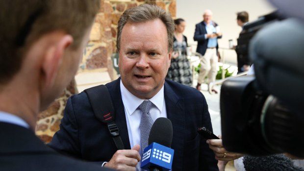 Called to account: Bill Pulver addresses the media after answering questions at a Senate inquiry.