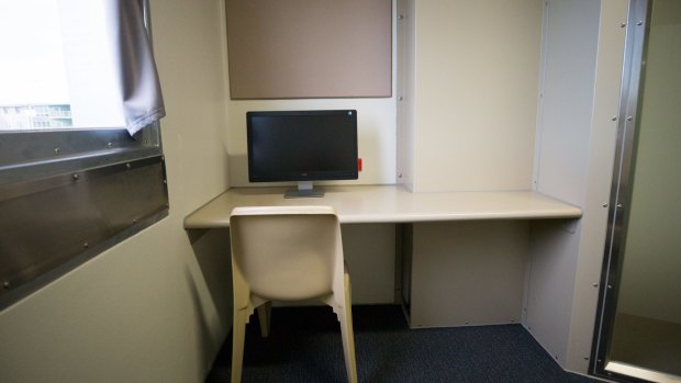 The cell comes with a desk and computer screen but no internet access.