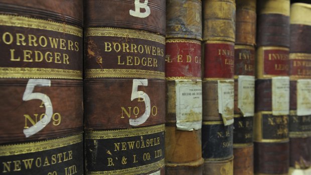 Ledgers from the 1800s at the ANU archives.