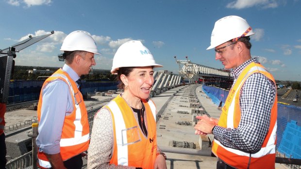 Transport Minister Andrew Constance, Premier Gladys Berejiklian and incoming Transport for NSW Secretary Rodd Staples inspect progress on Sydney Metro Northwest.