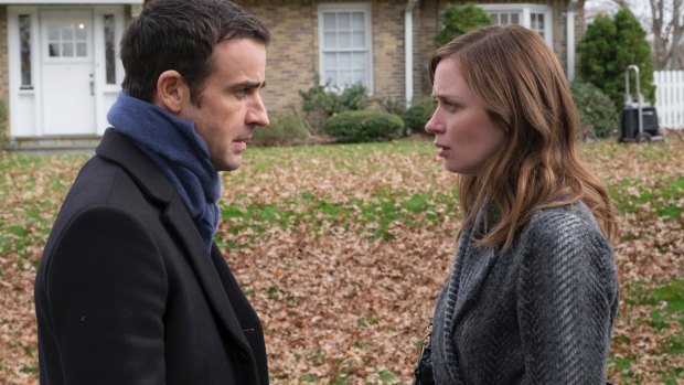 In this image released by Universal Pictures, Justin Theroux, left, and Emily Blunt appear in a scene from, <i>The Girl on the Train.</i>