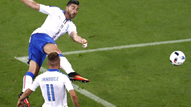 Italy's Graziano Pelle scores his side's second goal.