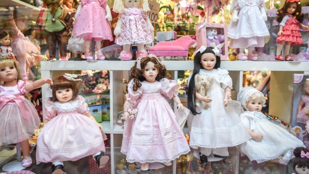 A collection of the beautifully dressed dolls in the Block Arcade window.
