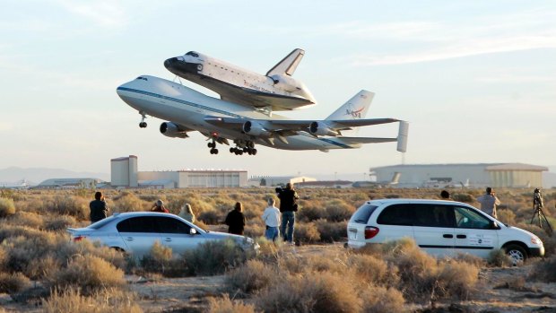 The Space Shuttle Atlantis takes off from Edwards Air Force Base in California atop a modified Boeing 747 en route to Kennedy Space Centre, Sunday on July 1, 2007. 