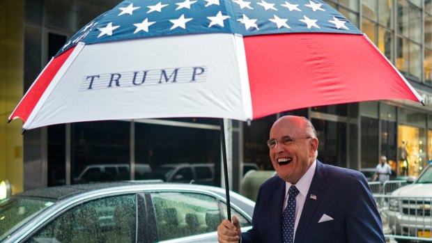 In damage control: Former New York City mayor Rudy Giuliani is one of few Republicans still in Trump's corner.