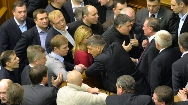 MPs argue at the Ukrainian parliament in Kiev.