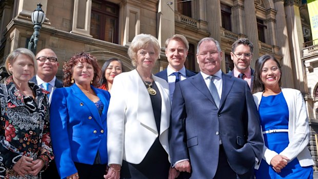 Team Doyle lining up outside Town Hall (from left) Sue Stanley, Kevin Louey, Beverley Pinder-Mortimer, Hope Wei, Susan Riley, Arron Wood, Nicholas Reece and Tessa Sullivan.