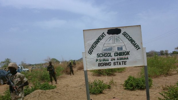 Soldiers stand guard in front of the government secondary school in Chibok in 2014, after more than 200 schoolgirls were abducted by Boko Haram.  