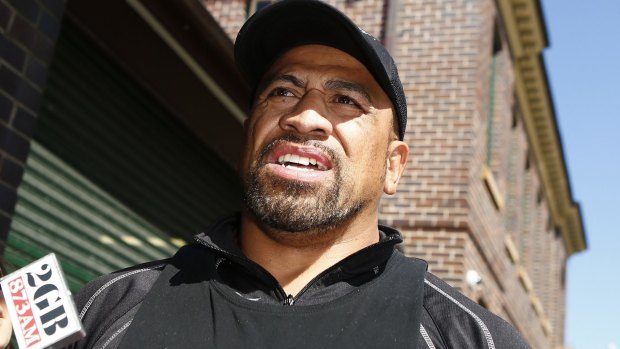 John Hopoate, freed on bail, leaves Manly police station on Friday.