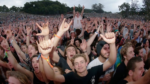 A large crowd at the amphitheatre watches Violent Soho perform on stage at Splendour In the Grass.