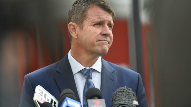 Premier Mike Baird has responded to strong criticism from NSW Liberal and National MPs.