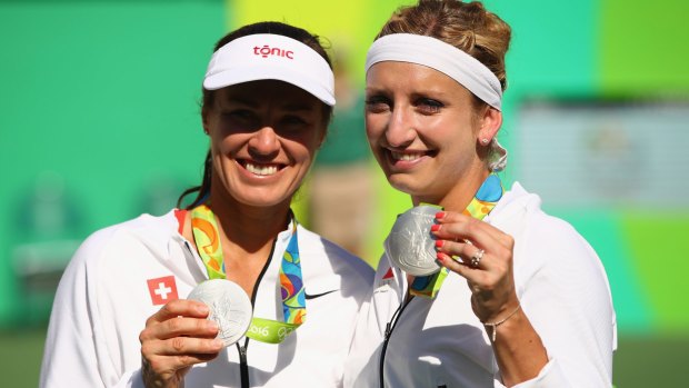 Settled for silver:  Martina Hingis and Timea Bacsinszky.