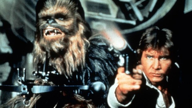 The terrier-like Chewbacca (Peter Mayhew) and original Han Solo (Harrison Ford) (right).