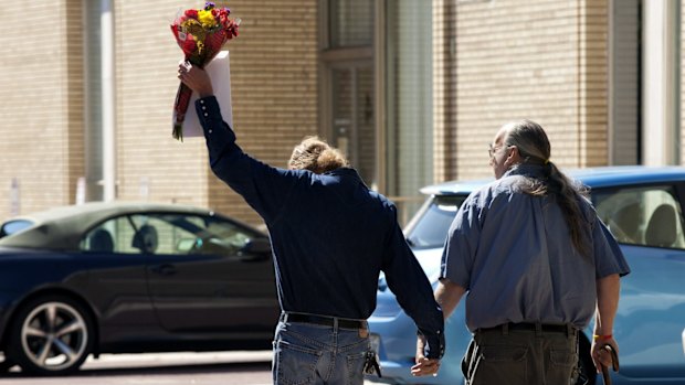 Legally wed: Donald Durst, left, and Michael Wolfe celebrate after legalising their marriage licence in Virginia on Monday.