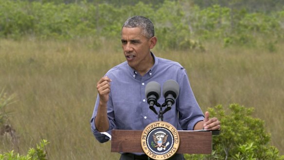 Barack Obama crusades against climate change, Republicans in Florida visit