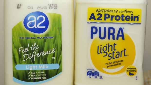 Bottles of milk from a2 and Pura, which both make A2 protein claims.