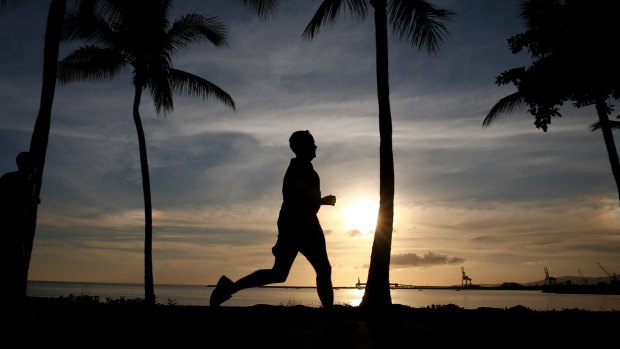 Opposition Leader Bill Shorten during an early morning run along The Strand in Townsville.