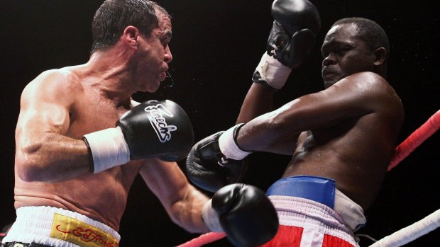 Jeff Fenech and Azumah Nelson exchange blows during their welterweight fight at the Vodafone Arena in Melbourne in 2008.