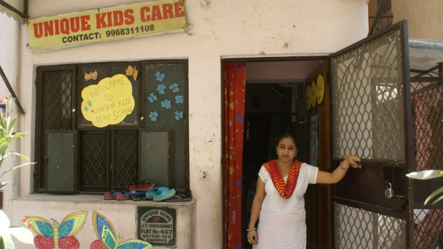 Rekha Saraswat runs a child care centre two doors from the adoption racket's office.