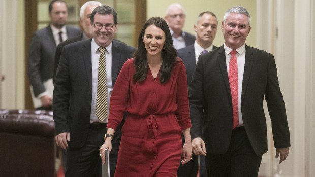 Jacinda Ardern with her entourage on Thursday night after hearing Winston Peters’ announcement.