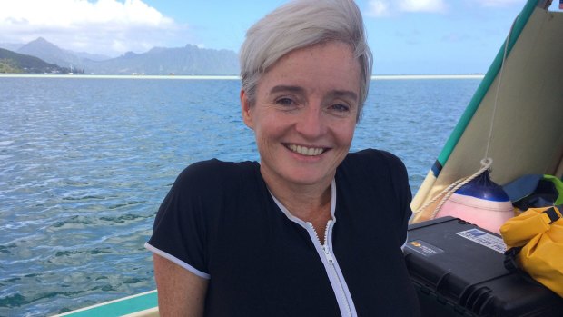 Hard-hitting science:
 Professor Emma Johnston meets other scientists studying and testing coral species that might be bred to endure warmer ocean environments.