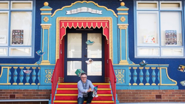 French mural artist Hugues Sineux with his latest mural at Epping Heights Public School.