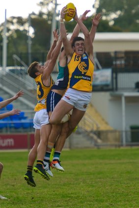 Jake Waterman clunks a contested mark against Peel Thunder.