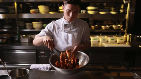 Chef Ralph So prepares Spice Temple's popular fish-fragrant eggplant.