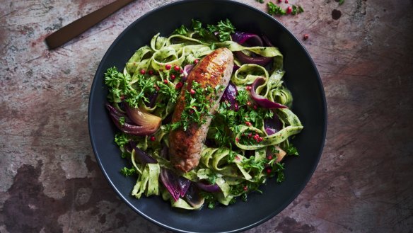 Sticky braised pork sausages with herb pappardelle.