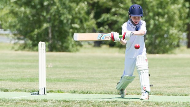 New format: Finn Carr of Marist College plays a shot during the trial of the new cricket rules used in the Canberra junior competition this year.