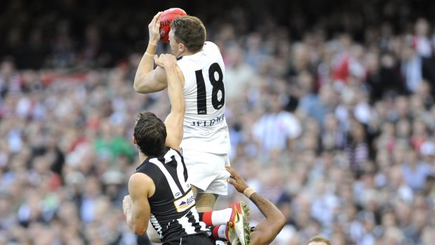 Last gasp: Brendon Goddard soars for a mark in the final quarter of the drawn grand final in 2010