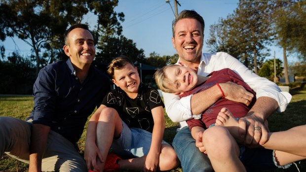 Simon Duffy and his partner Wally say it is impossible to explain to their sons why they can't get married in Australia. 