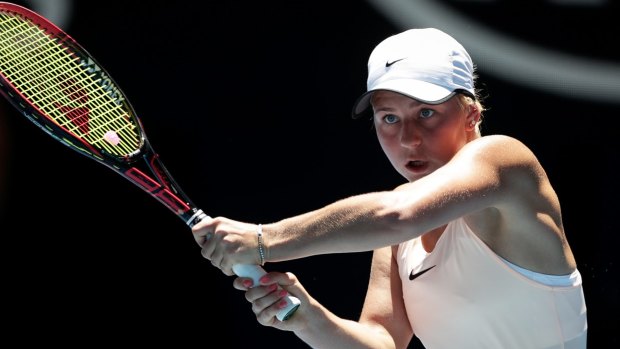 Marta Kostyuk hits the ball in her match against Elina Svitolina at the Australian Open. 