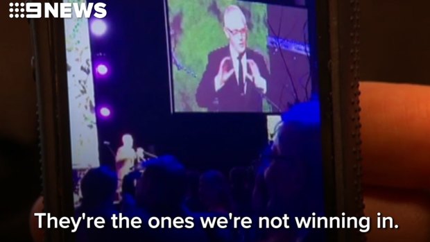 Malcolm Turnbull mimics the US President at the Midwinter Ball in Canberra.