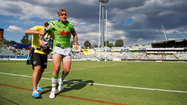 Hobbled: Blake Austin comes off with a knee injury during Canberra's win over Penrith. 