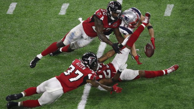 Fingertip precision: Julian Edelman with the catch that turned the Super Bowl