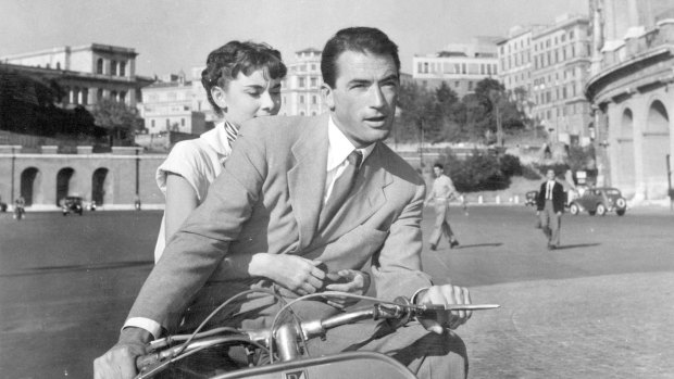 Audrey Hepburn and Gregory Peck in a Roman holiday.