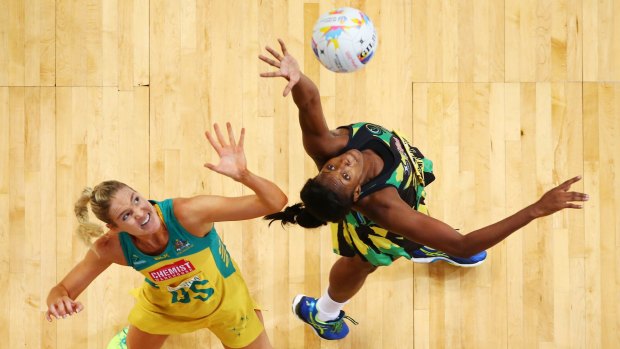 Caitlin Bassett of the Diamonds competes with Jamaica's Stacian Facey.