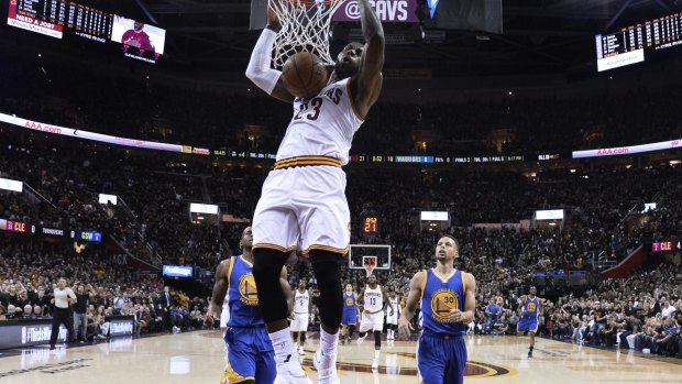 James dunks during the first half.