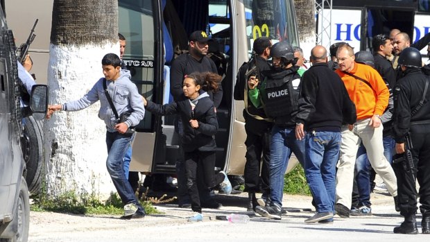Tourists and visitors from the Bardo museum in Tunis are evacuated during the attack.