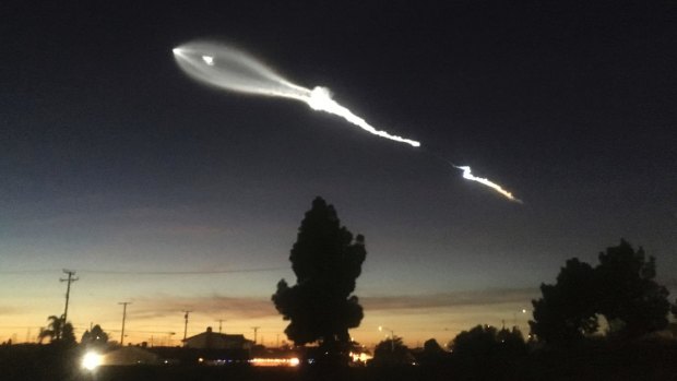 The contrail from a SpaceX Falcon 9 rocket is seen from Long Beach in California, more than 100 miles southeast from its launch site.