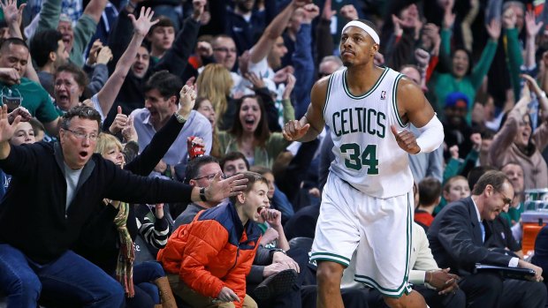 Celtic pride: The Boston crowd reacts after Paul Pierce hits a huge three-pointer in the final seconds of a game against the LA Clippers.