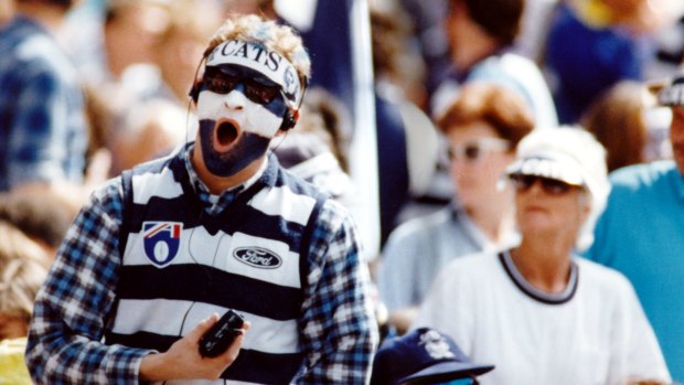 This Geelong supporter grabs a quick yawn.