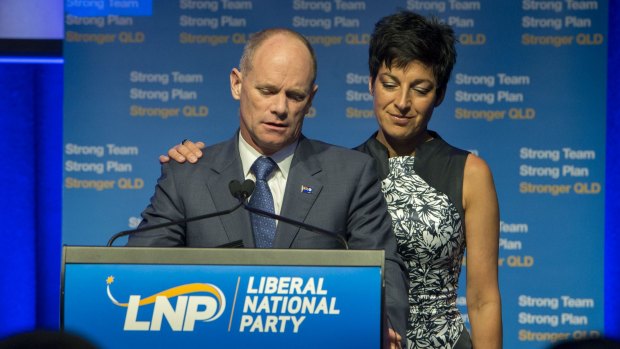Campbell Newman and his wife Lisa address LNP supporters on election night. The Queensland premier lost his seat and his part lost government.